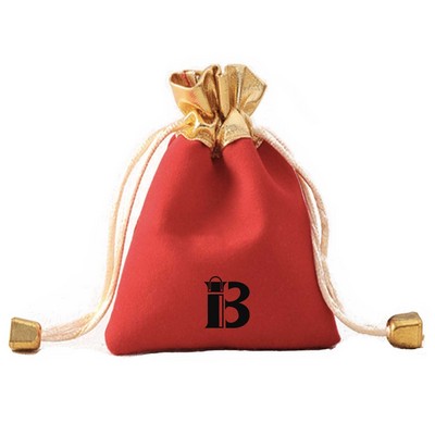 Red velvet jewelry bag w/ gold - plated edges and opening